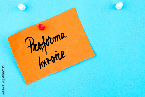 Proforma Invoice written on orange paper note