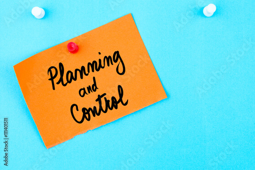 Planning and Control written on orange paper note