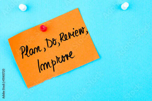 Plan, Do, Review, Improve written on orange paper note