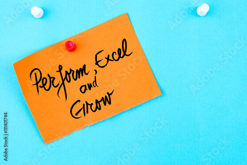 Perform, Excel and Grow written on orange paper note