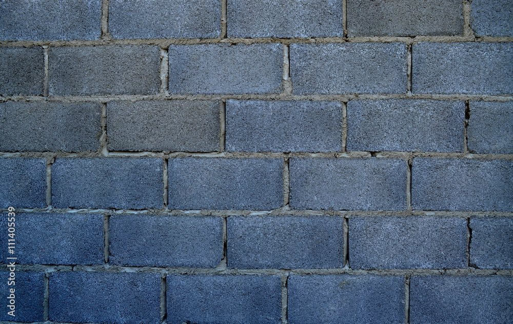 Obraz premium Grey cement block wall