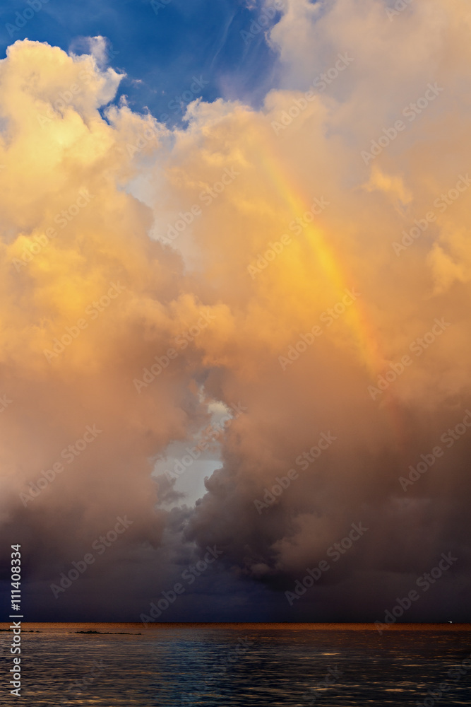 rainbow beautiful seaside at the time of sunset, storm clouds rainbow beautiful seaside at the time of sunset, storm clouds