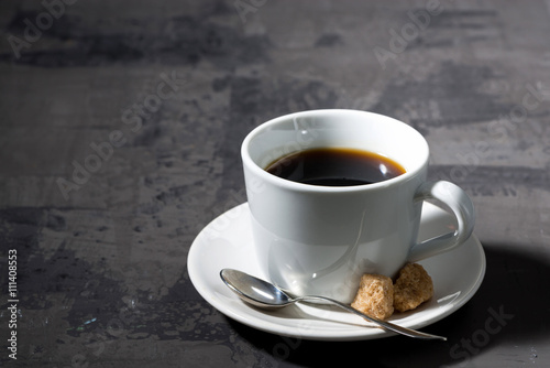 cup of black coffee on a dark background