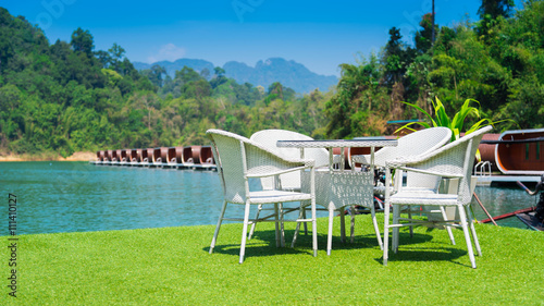 White chair and lake view in morning