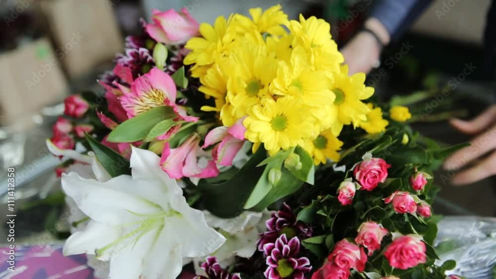 Yellow, pink and white flowers putten in one big bouquet. Yellow, pink and white flowers putten in one big bouquet.