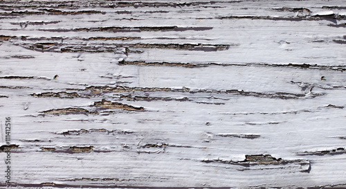 Holzwand mit abgeblätterter Farbe