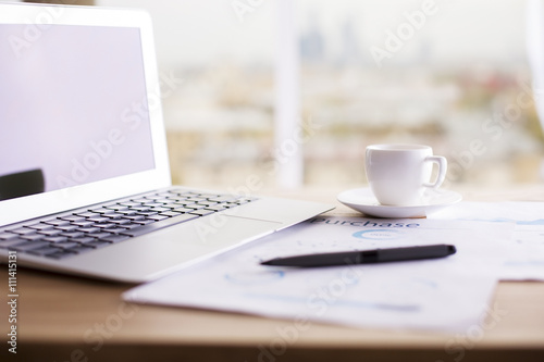 Office desktop with laptop
