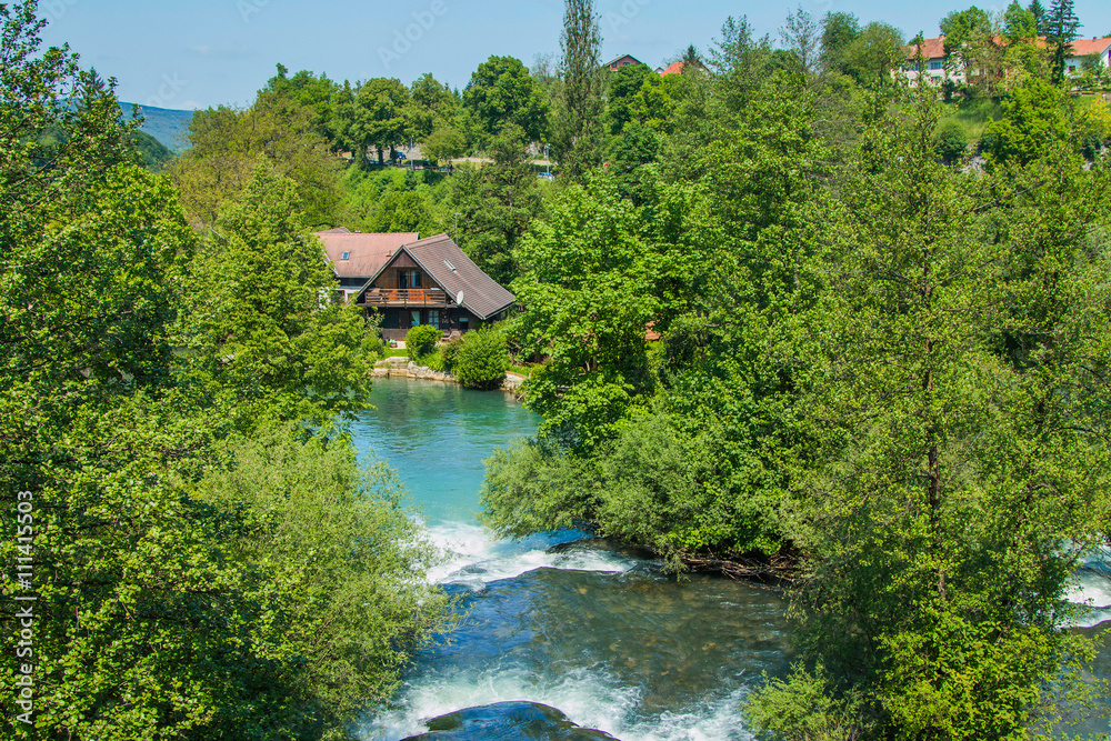 Beautiful village of Rastoke near Slunj in Croatia, river Slunjcica, old water mills on waterfalls Beautiful village of Rastoke near Slunj in Croatia, river Slunjcica, old water mills on waterfalls