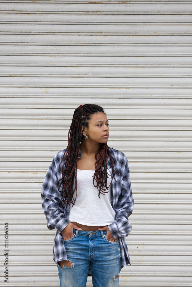 young woman with ripped jeans young woman with ripped jeans