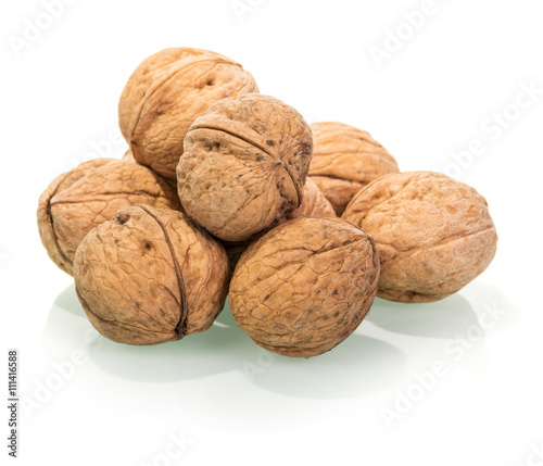 Much of whole walnuts isolated on white.