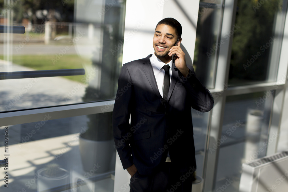Businessman on a phone in the office Businessman on a phone in the office