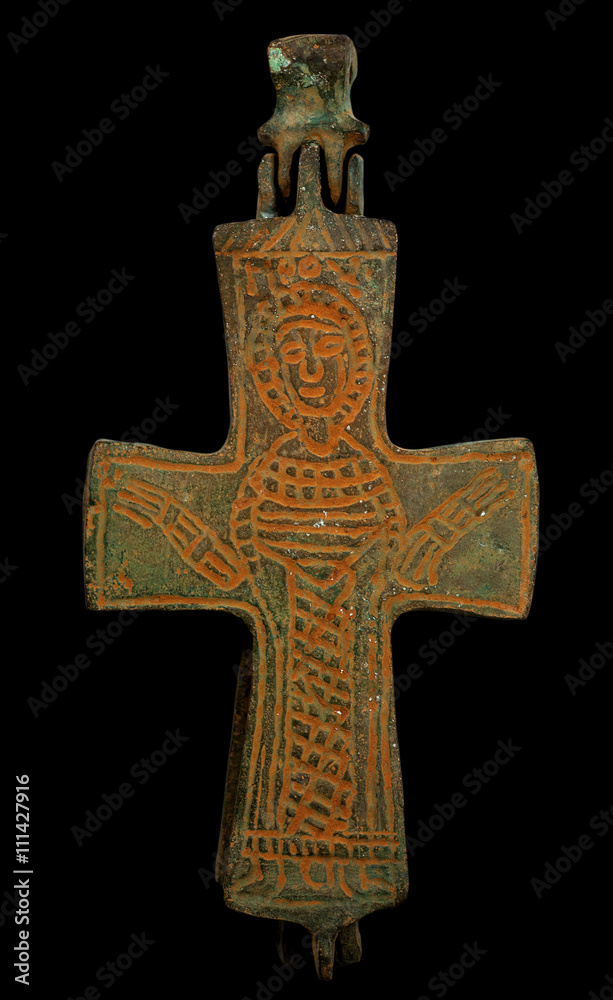 Ancient copper Byzantine cross in brown patina