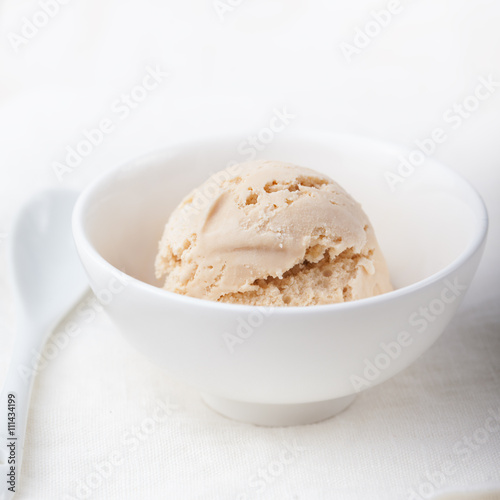 Ice cream with Earl grey tea flavor in white bowl