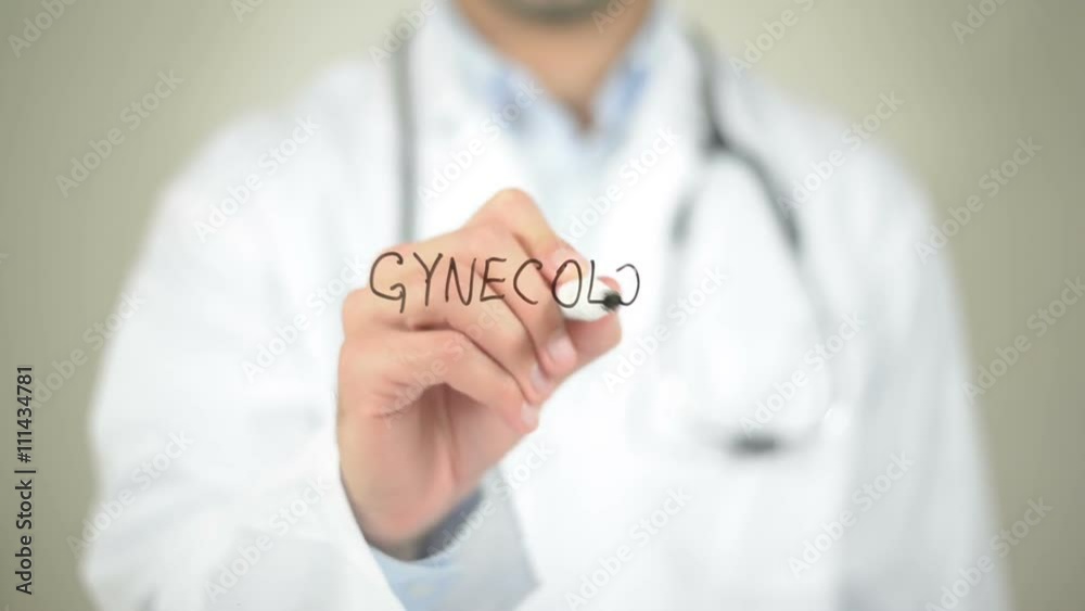Gynecologist, Doctor writing on transparent screen Gynecologist, Doctor writing on transparent screen