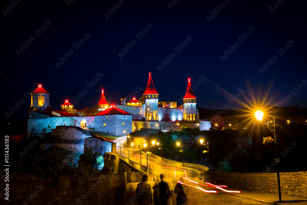 nighttime view on Kamenetz-Podolsky fortress in lights