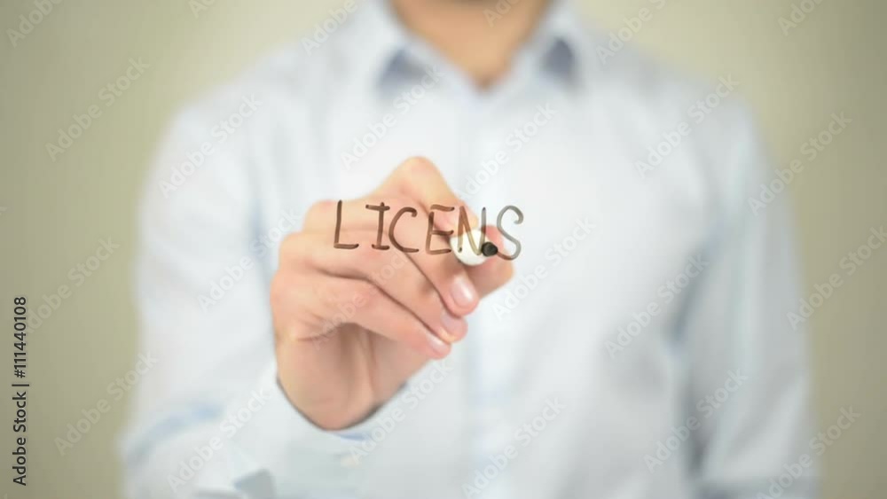 License, Man writing on transparent screen License, Man writing on transparent screen