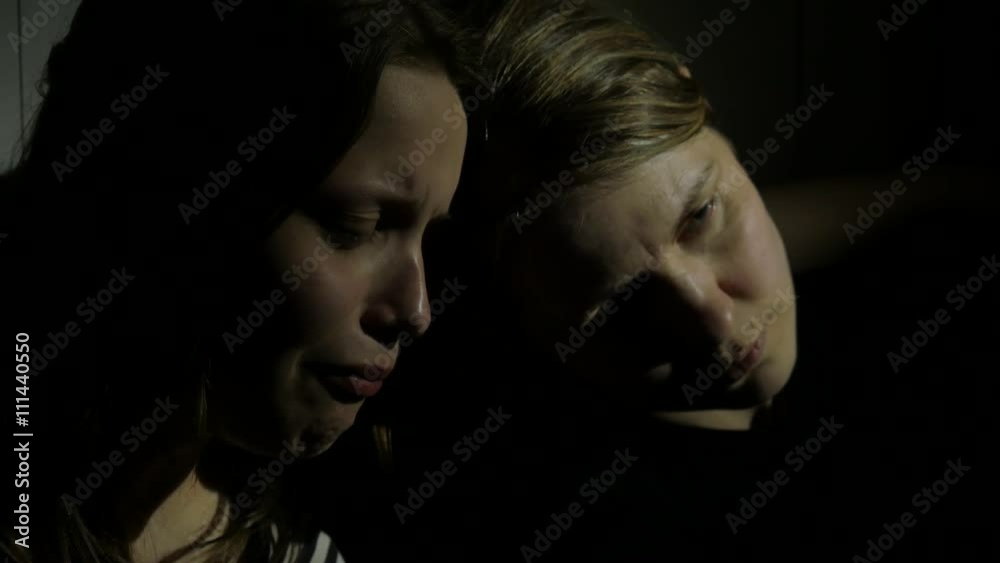 Two girls holding each other. Sisters or mother and daughter or friends. 4K UHD Two girls holding each other. Sisters or mother and daughter or friends. 4K UHD