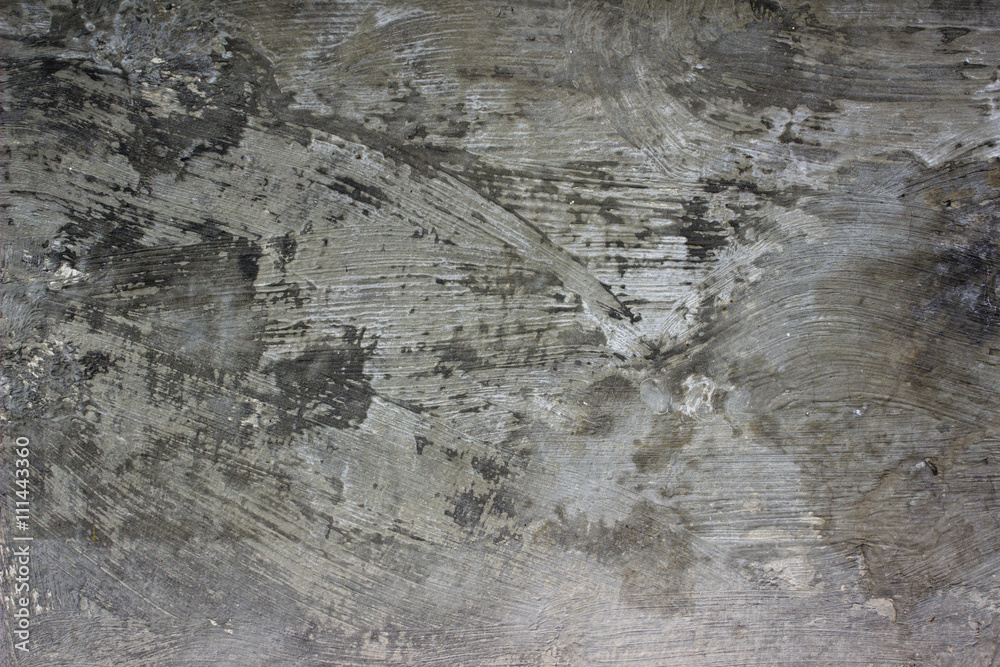 Od grunge wall, concrete texture with rough brush strokes. Old gray wall urban background.