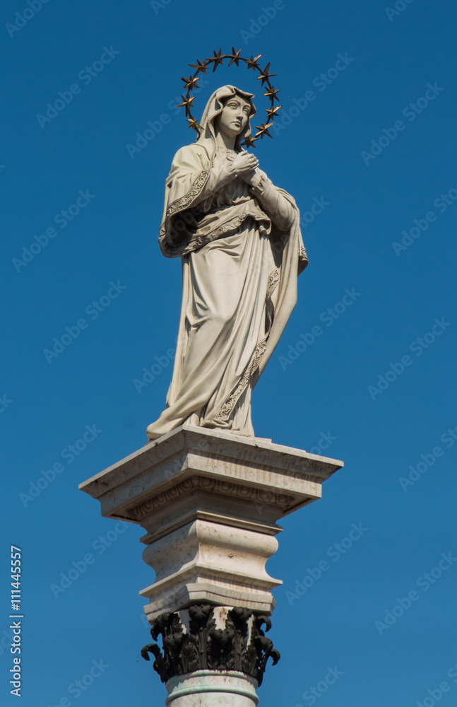 Statue of Our Lady of the Immaculate Conception in the middle of