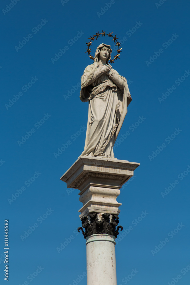 Statue of Our Lady of the Immaculate Conception in the middle of