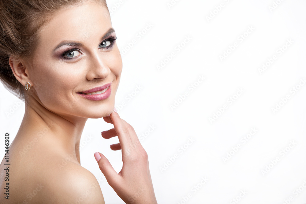 Beauty model girl with perfect make-up isolated over white. Portrait of attractive young woman with blond hair on white background. Beautiful female face with clear fresh skin Beauty model girl with perfect make-up isolated over white. Portrait of attractive young woman with blond hair on white background. Beautiful female face with clear fresh skin