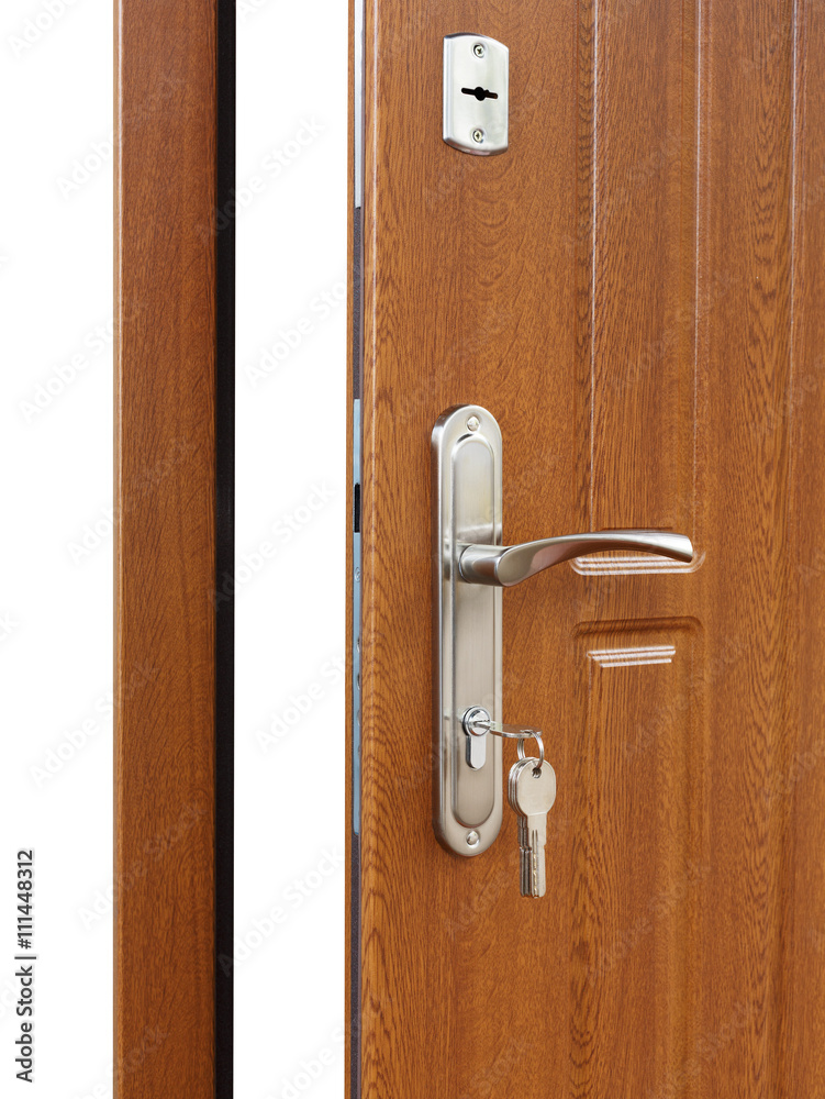 Open brown wooden door handle with lock. Open brown wooden door handle with lock.