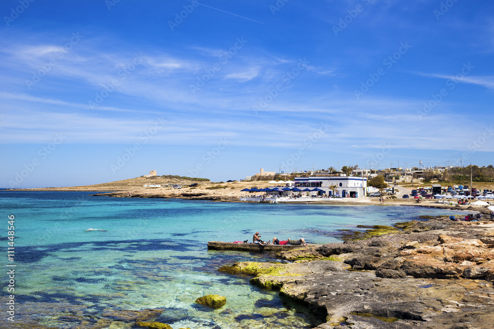 Palm beach, Malta on a sunny day with blue sky