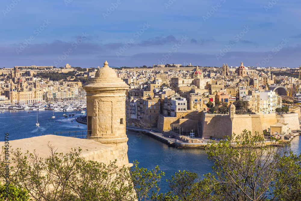 Malta - Watch tower of Valletta with panoramic view of Malta with blue sky