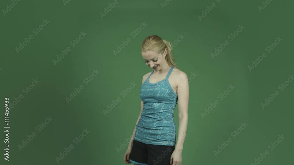 caucasian woman in sport outfit isolated on chroma green screen background strength confident caucasian woman in sport outfit isolated on chroma green screen background strength confident