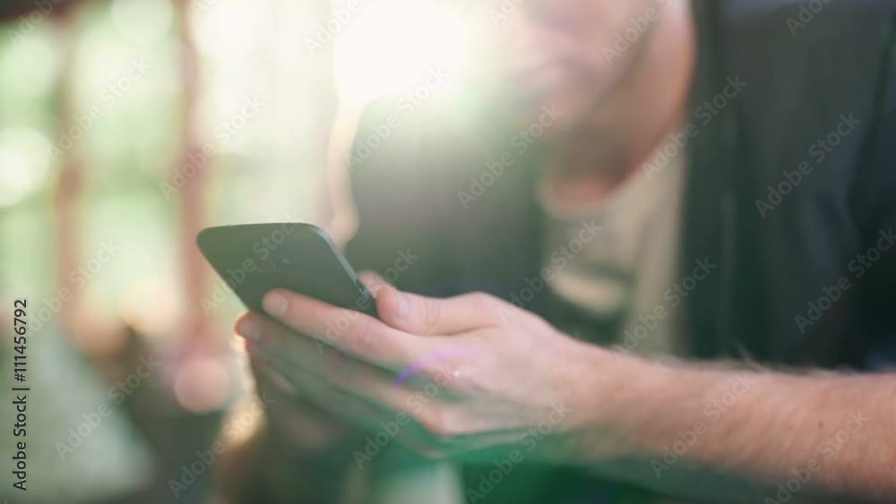 close-up hand of business man working from home or workplace using smart phone
