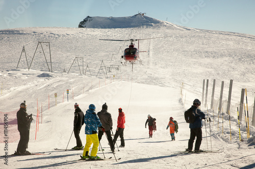 Helicopter landing near Matterhorn, Switzerland photo