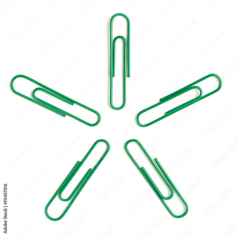 green paper clips arranged on white background. green paper clips arranged on white background.