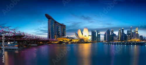 Billede på lærred Singapore skyline, marina bay at dusk