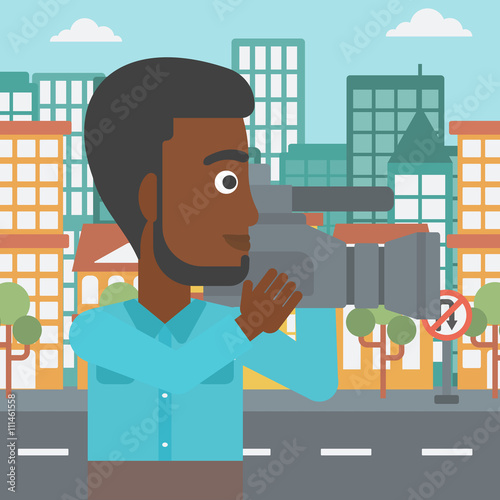 Cameraman with video camera.