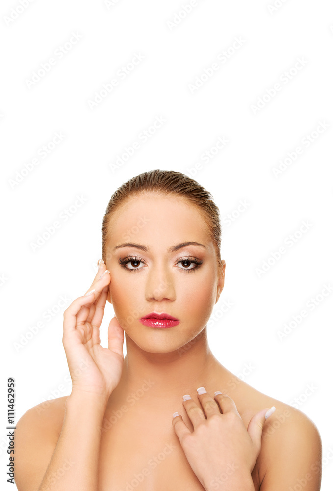 Beautiful spa woman touching her face. Beautiful spa woman touching her face.