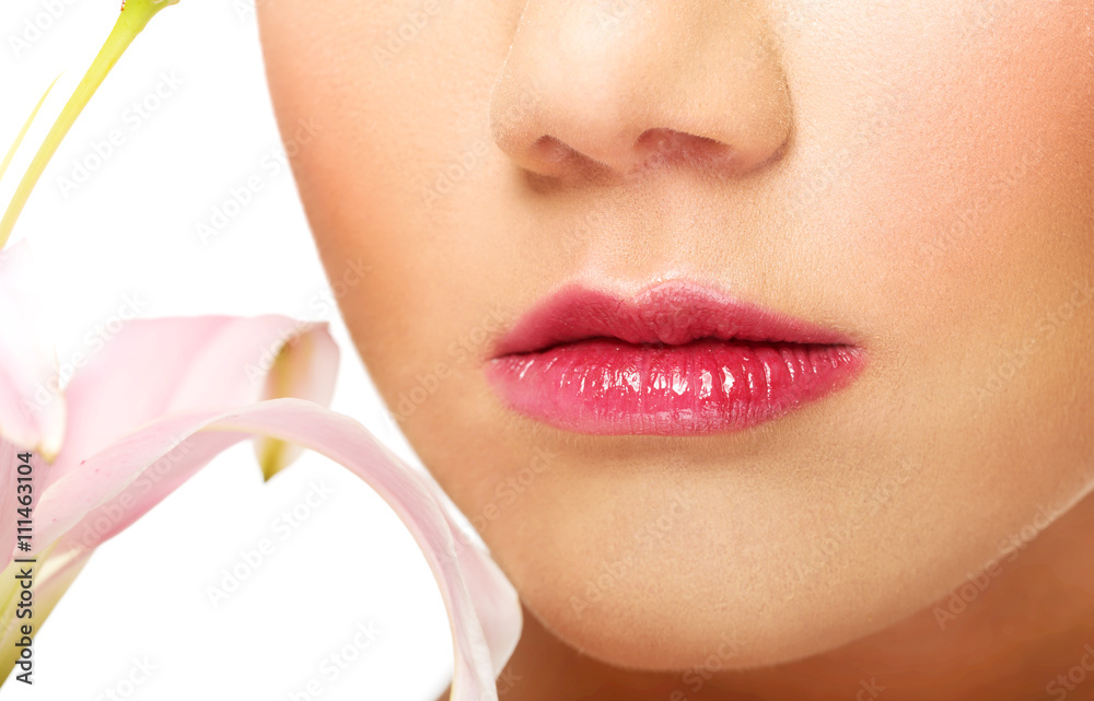 Female lips and lily flower. Female lips and lily flower.