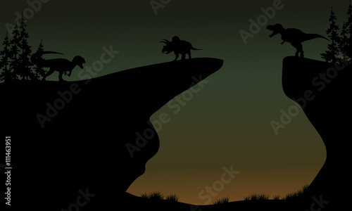 Silhouette of Triceratops and Allosaurus