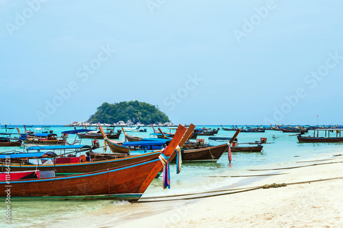 Passenger boats parked on the beach in Lipe island, Thailand © SasinParaksa