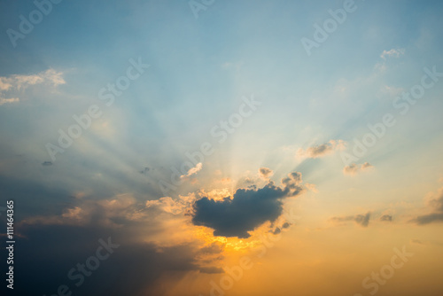 sun rays are striking through the clouds © bouybin