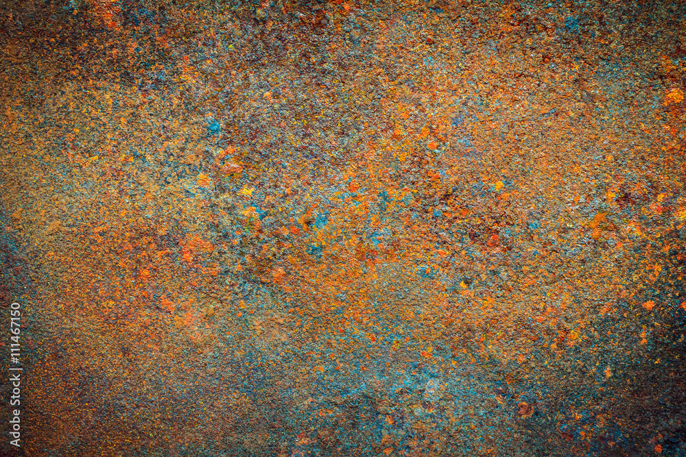 Rusty dirty iron metal plate background. Old rusty metal. Colorful rusted metal with copy space for text or image. Dark edged Rusty dirty iron metal plate background. Old rusty metal. Colorful rusted metal with copy space for text or image. Dark edged