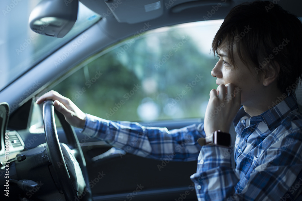 Young men are driving a car Young men are driving a car