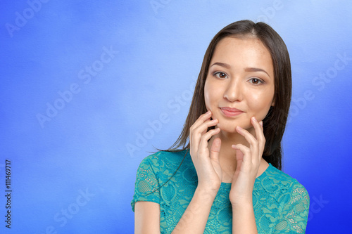 Casual mixed-race Asian Caucasian woman smiling looking happy