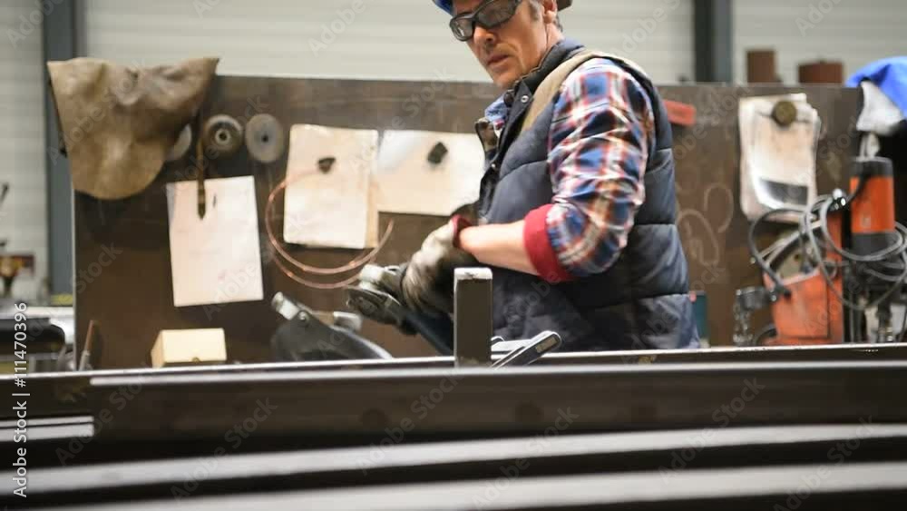 Man working in steelworks factory Man working in steelworks factory