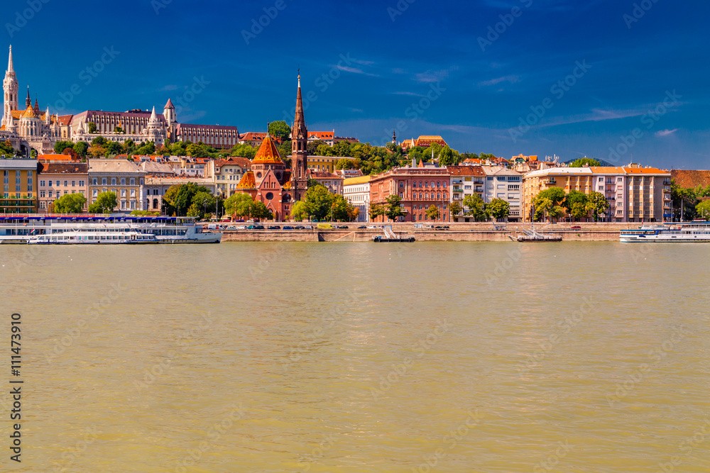 Fototapeta premium Modern and ancient buildings on the Danube River