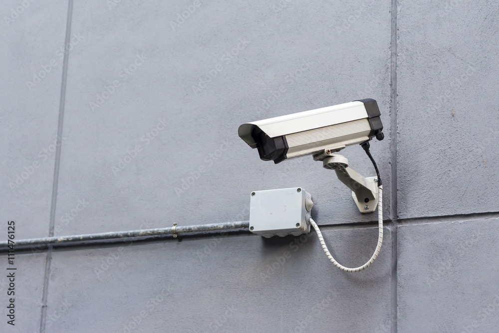 Security camera on the wall.