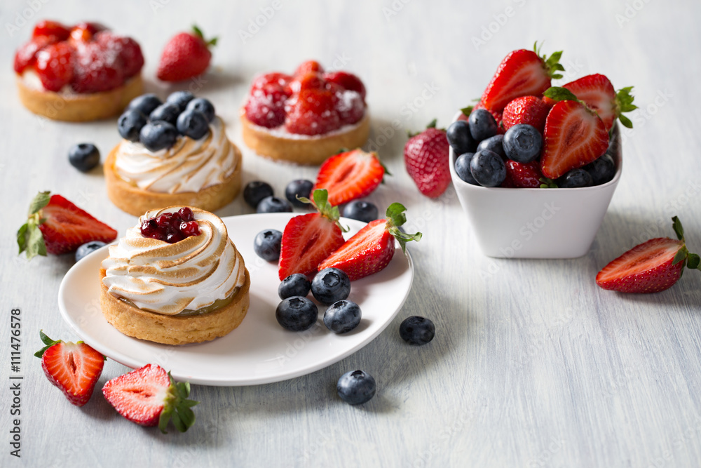Fresh berry tarts with strawberry and blueberry 