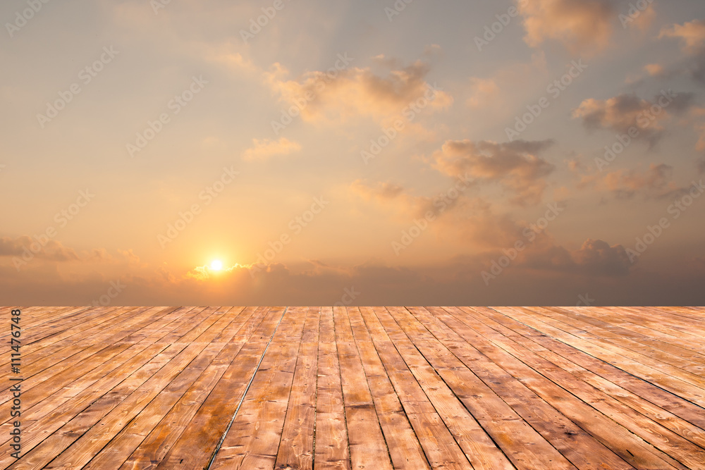 Wooden floor and sunrise. Beautiful nature background