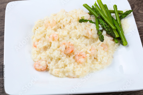 Risotto with shrimps and astaragus photo
