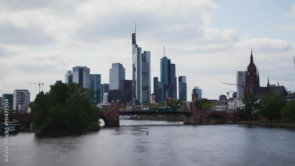 FRANKFURT, GERMANY – May 14, 2016: Timelapse movie showing clouds moving over the skyline of Frankfurt am Main, Germany. FRANKFURT, GERMANY – May 14, 2016: Timelapse movie showing clouds moving over the skyline of Frankfurt am Main, Germany.