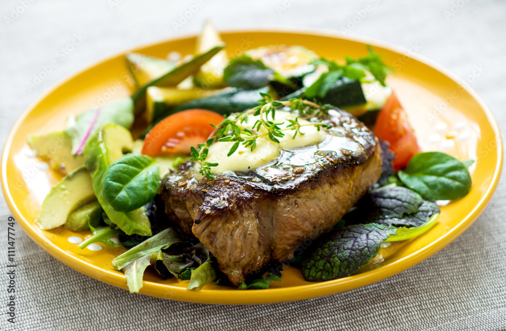 Grilled beef steak with herb buter and vegetable Grilled beef steak with herb buter and vegetable